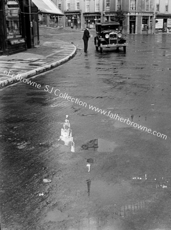 THE CATHEDRAL REFLECTED IN PUDDLE